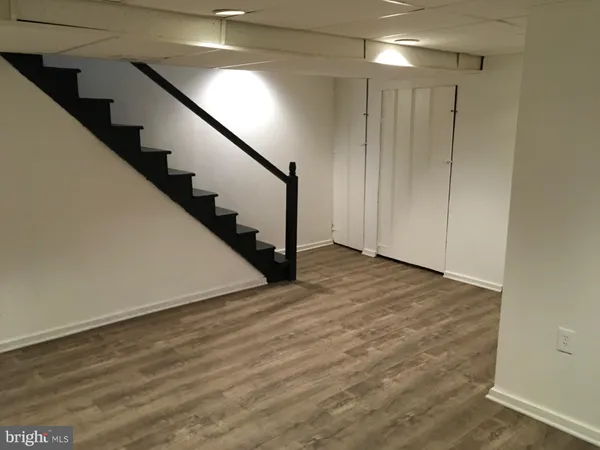 a view of entryway with wooden floor