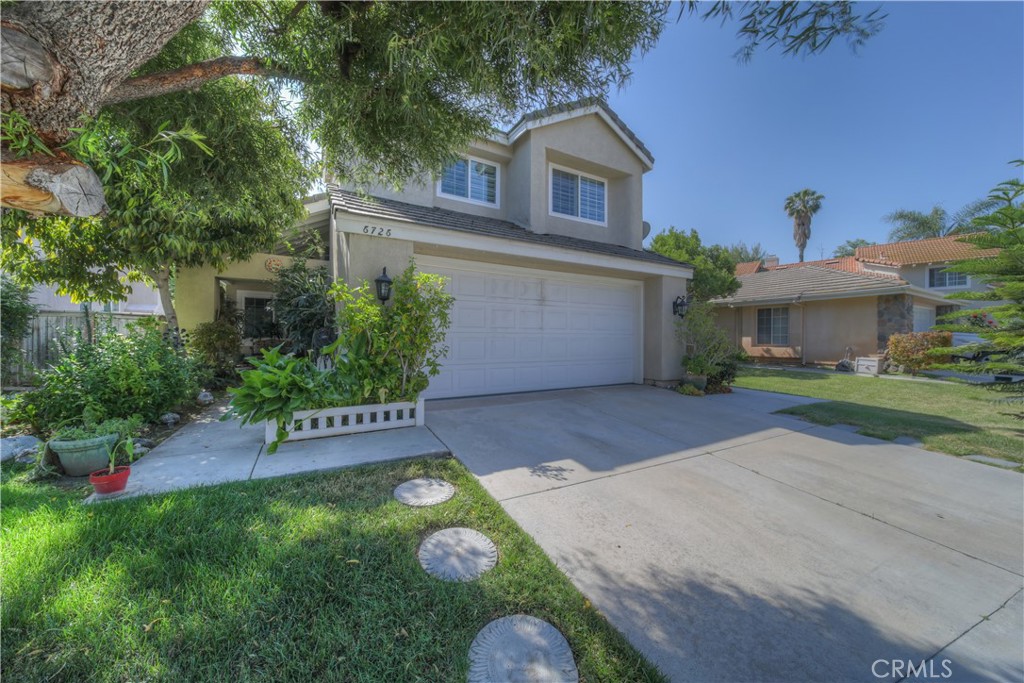 6726 Dove Lane Riverside, CA 92506 - Photo 1 of 1 a front view of a house with a yard