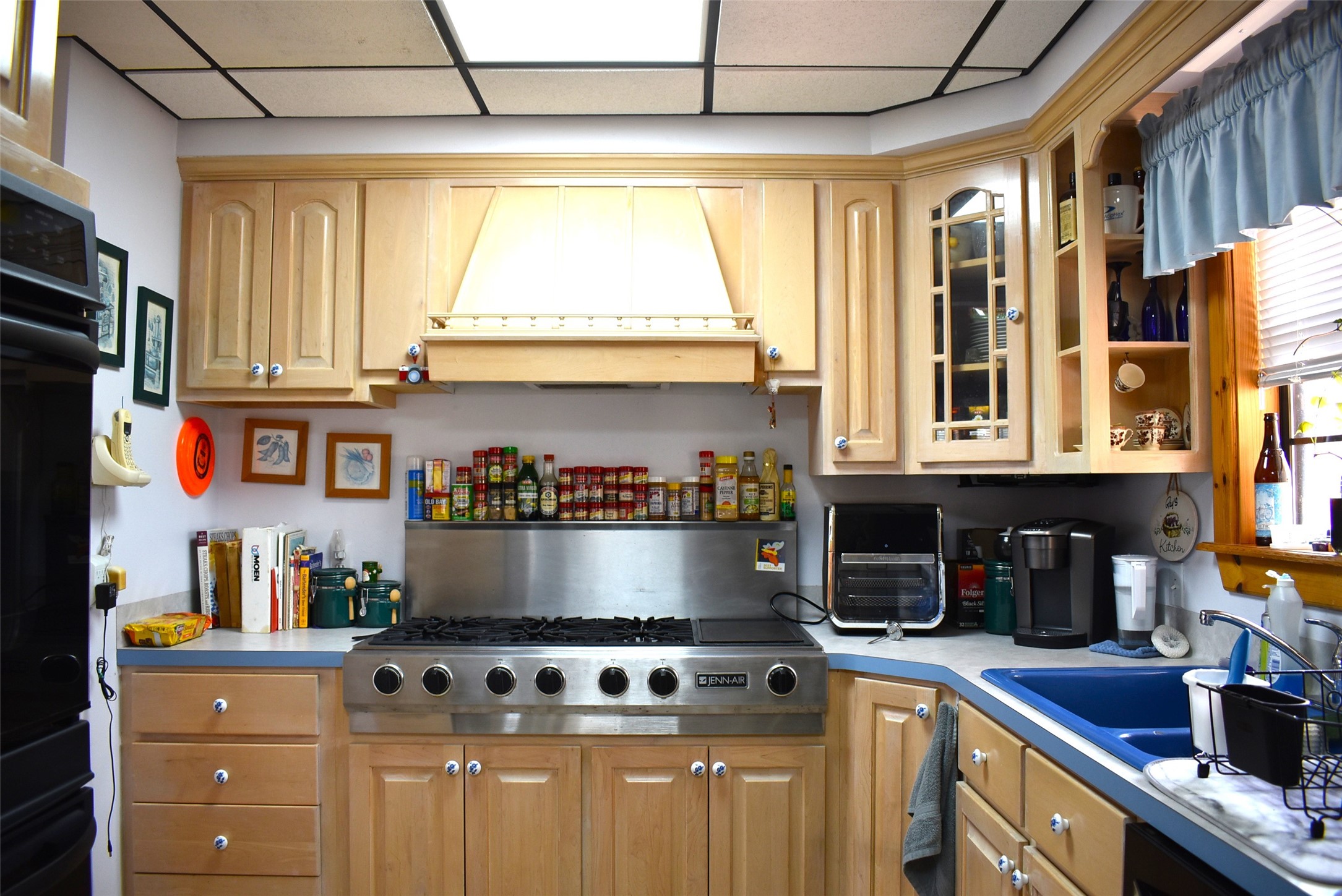 1657 County Road Sargent, TX 77414 - Photo 14 of 50 a kitchen with stainless steel appliances granite countertop a stove and a sink