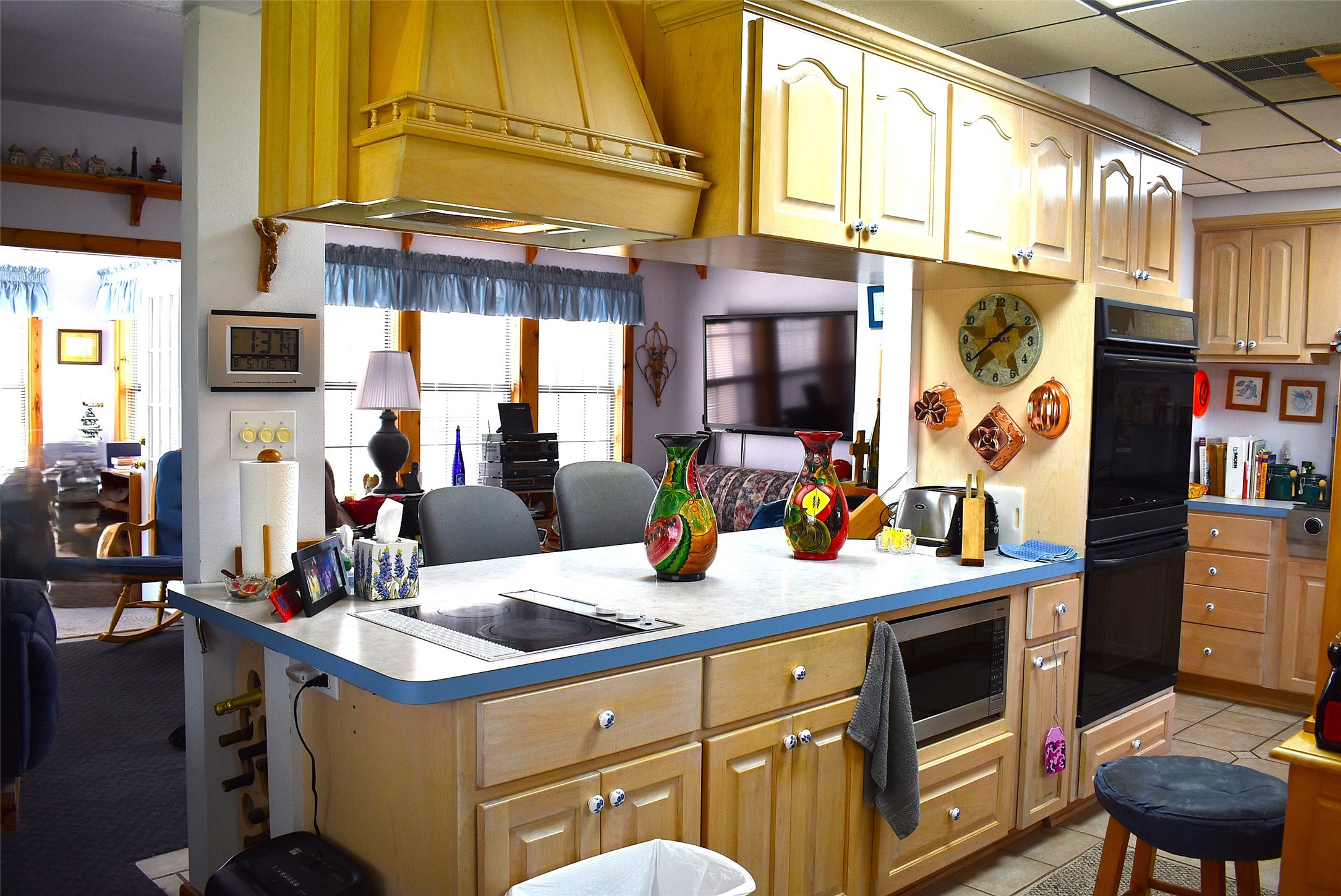 1657 County Road Sargent, TX 77414 - Photo 18 of 50 a kitchen that has a lot of cabinets in it