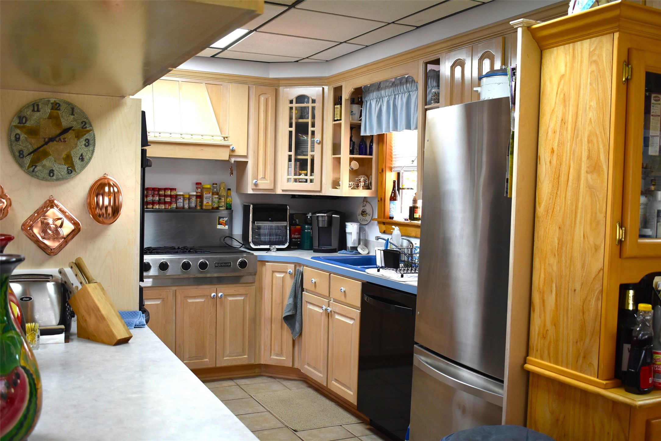 1657 County Road Sargent, TX 77414 - Photo 19 of 50 a kitchen with stainless steel appliances granite countertop a refrigerator and a stove