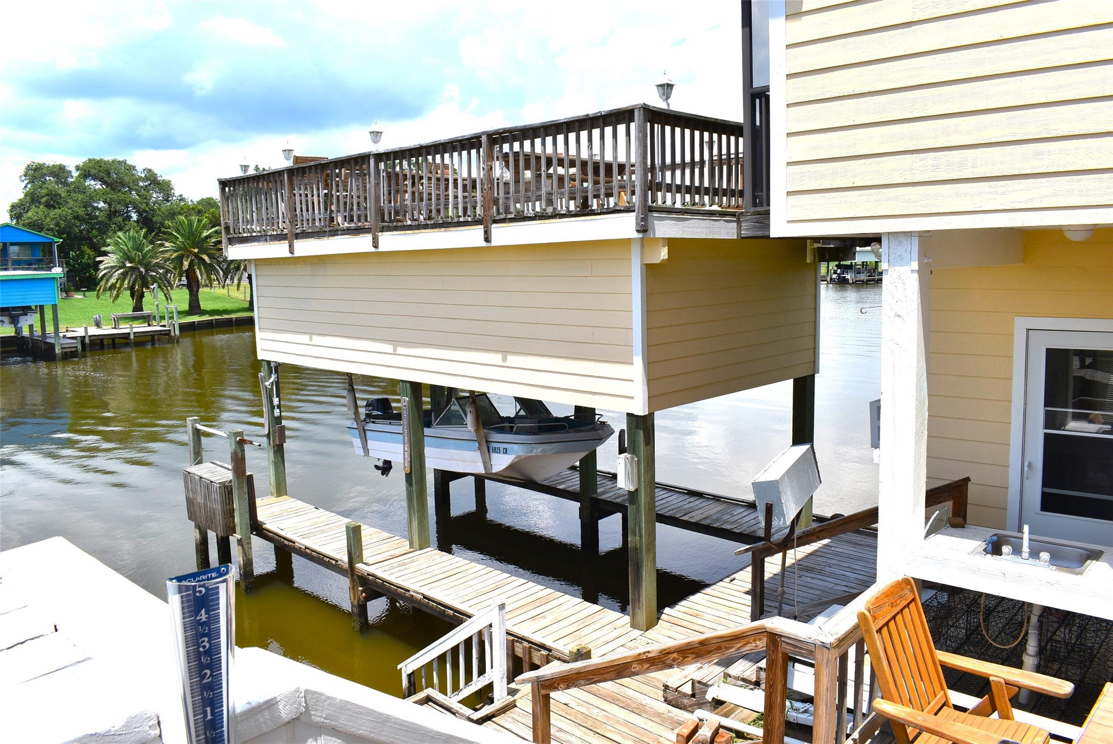 1657 County Road Sargent, TX 77414 - Photo 31 of 50 a balcony with table and chairs