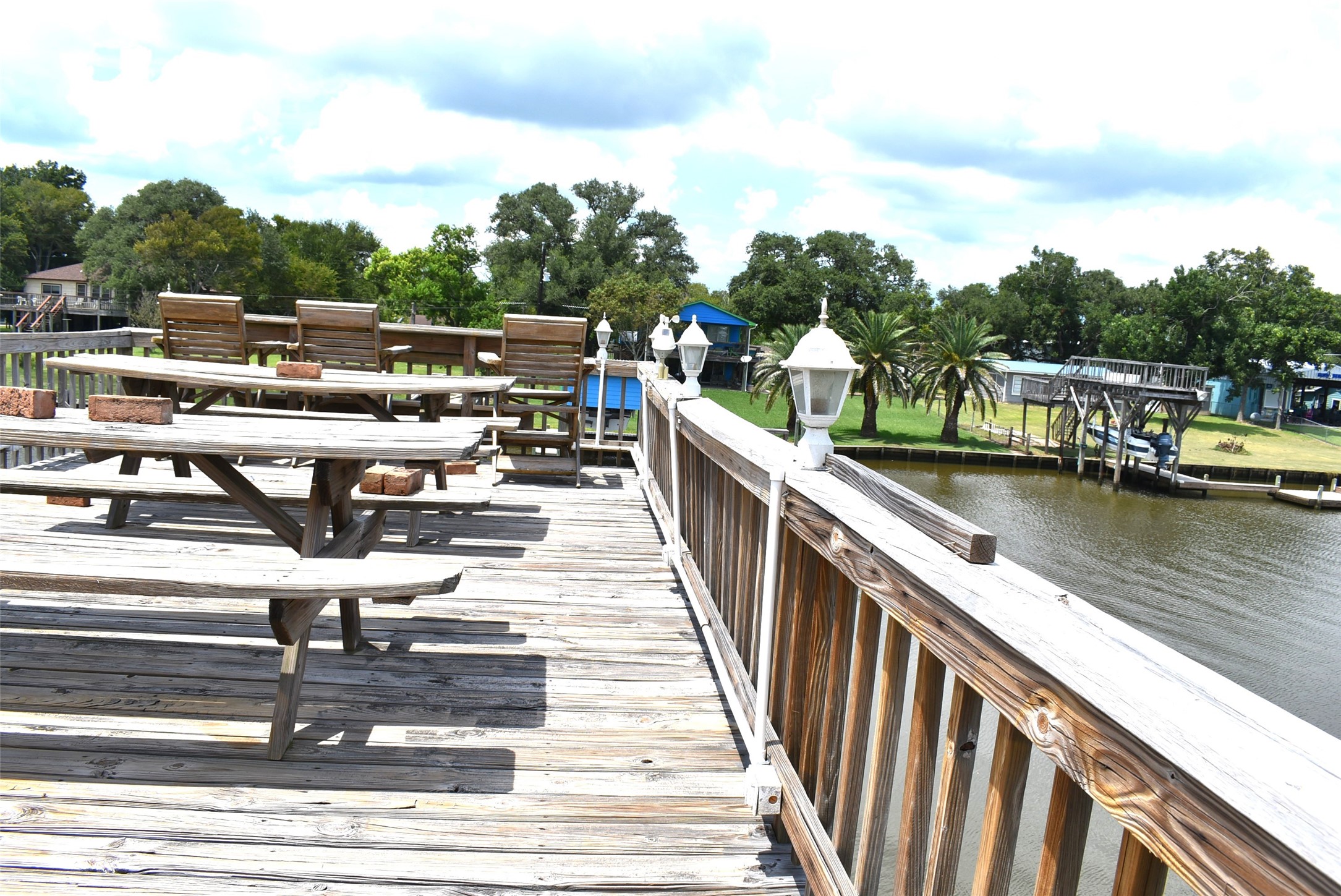1657 County Road Sargent, TX 77414 - Photo 36 of 50 a view of a lake from a balcony