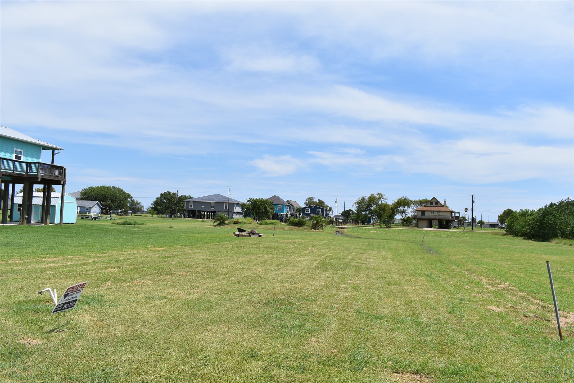 1657 County Road Sargent, TX 77414 - Photo 44 of 50 a view of a field with an ocean