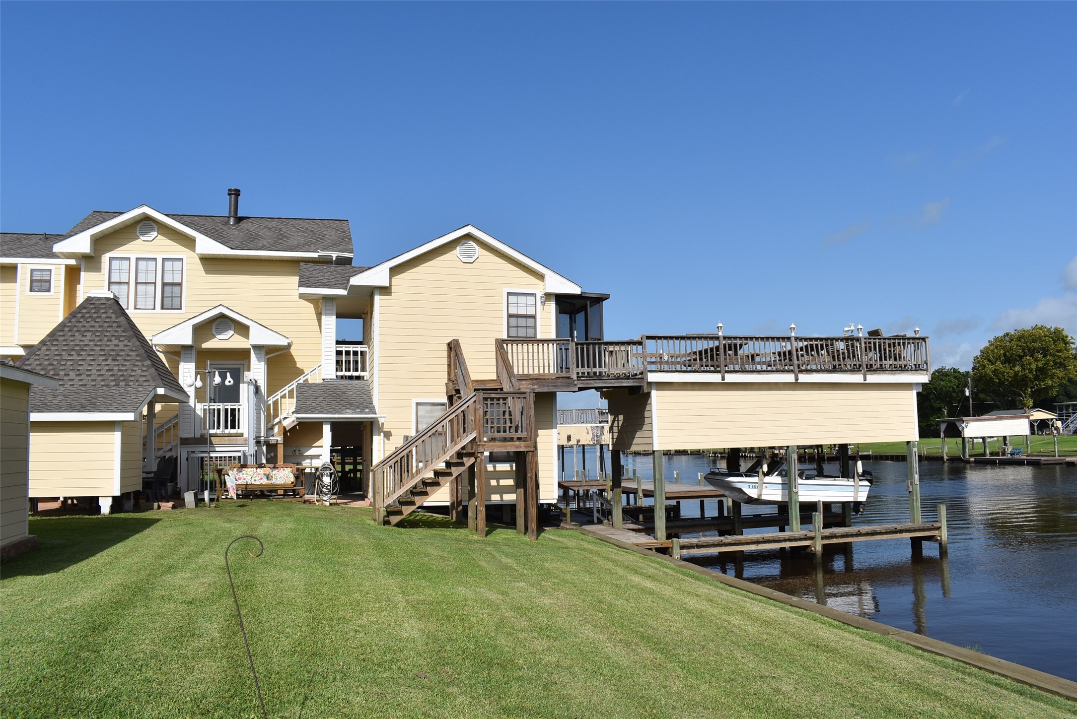 1657 County Road Sargent, TX 77414 - Photo 8 of 50 a view of a house with a yard balcony and sitting area