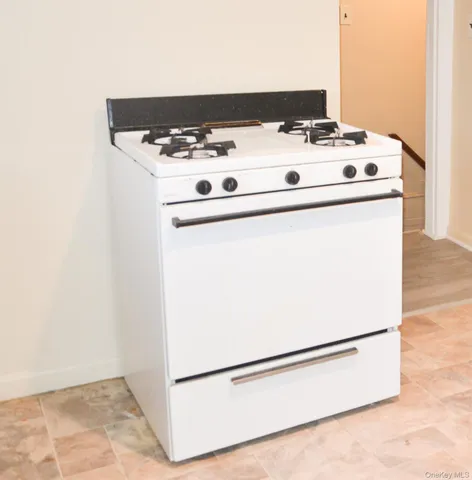 a utility room with washer and dryer