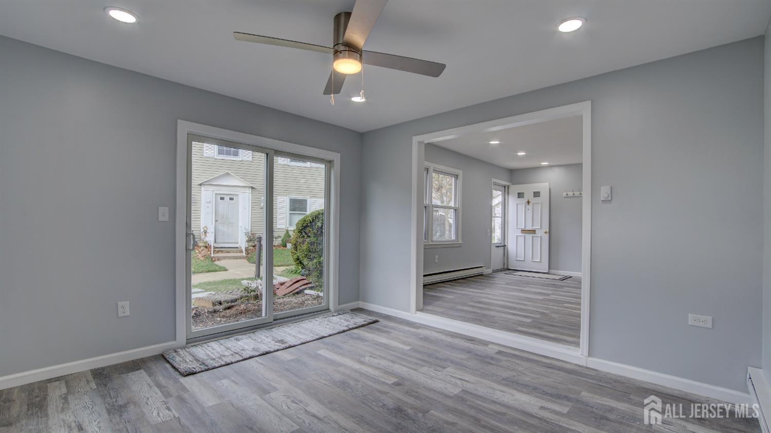 146 B Old Nassau Road Monroe Township, NJ 08831 - Photo 33 of 46 wooden floor in an empty room with a window