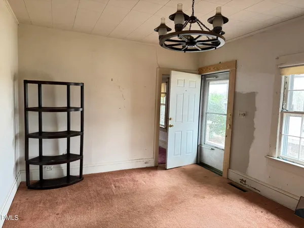 a view of a livingroom with a staircase