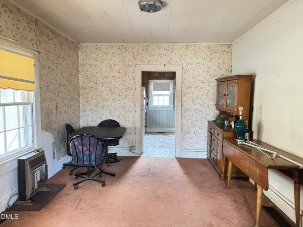 a room with furniture and a window