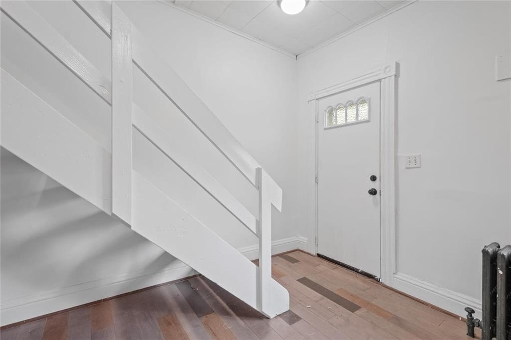 2012 Spring Street Pittsburgh, PA 15210 - Photo 19 of 20 a view of an entryway with wooden floor
