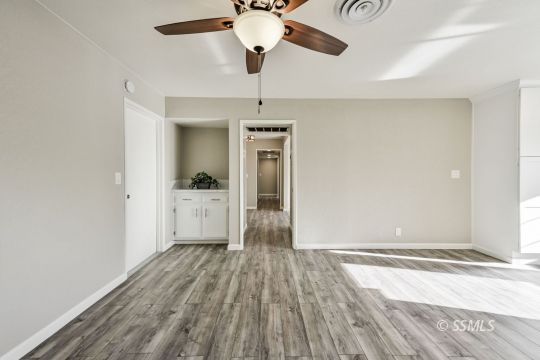 320 Dawn Court Ridgecrest, CA 93555 - Photo 9 of 24 a view of a room with wooden floor