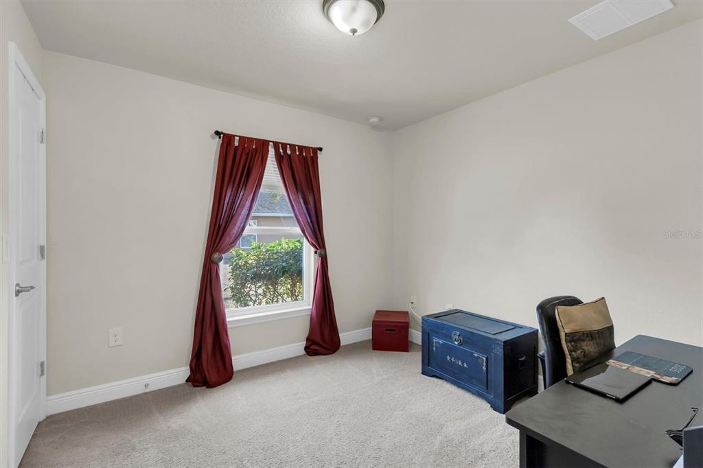 3455 Whispy Court Spring Hill, FL 34609 - Photo 15 of 42 a view of workspace with furniture and window