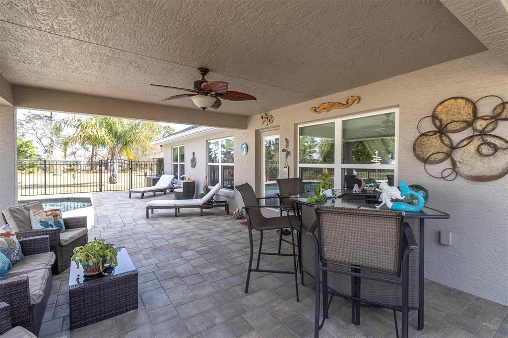 3455 Whispy Court Spring Hill, FL 34609 - Photo 27 of 42 a view of a dining room with furniture window and outside view