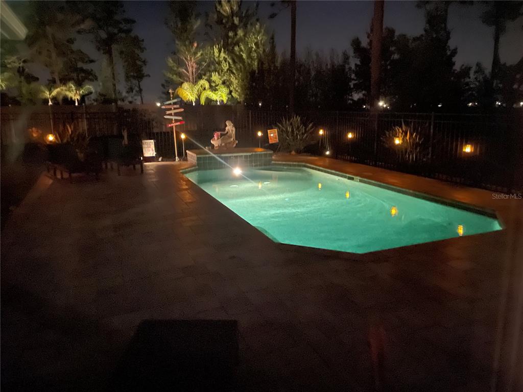 3455 Whispy Court Spring Hill, FL 34609 - Photo 32 of 42 a view of a golf course with a swimming pool