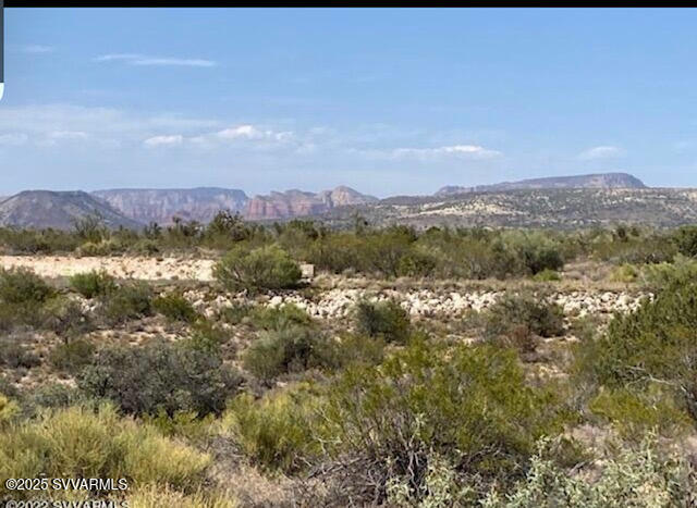 6745 North Canyon Road, Unit 104 Rimrock, AZ 86335 - Photo 17 of 31 a view of a city with mountains in the background