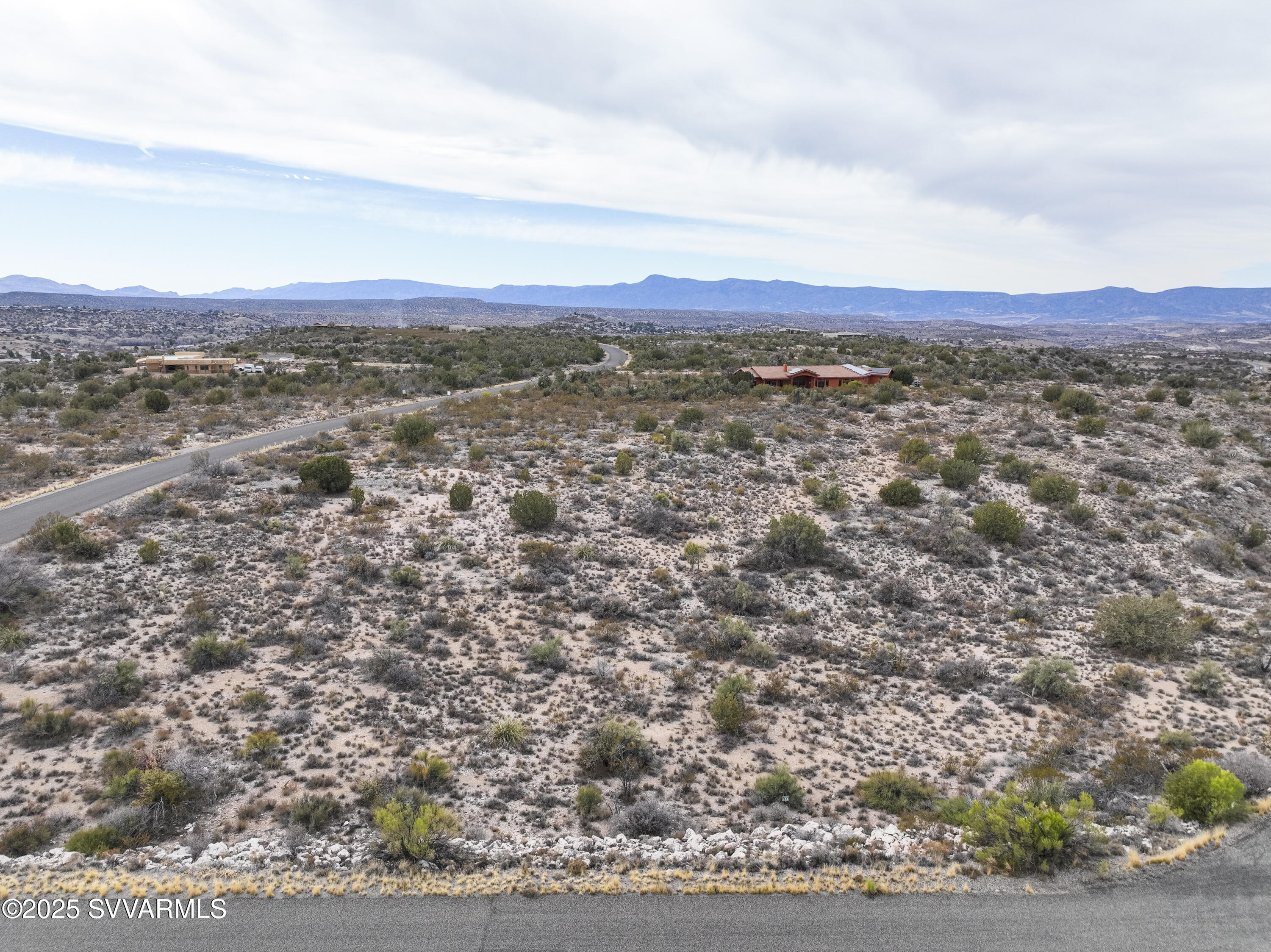 6745 North Canyon Road, Unit 104 Rimrock, AZ 86335 - Photo 19 of 31 an aerial view of residential houses with outdoor space and trees