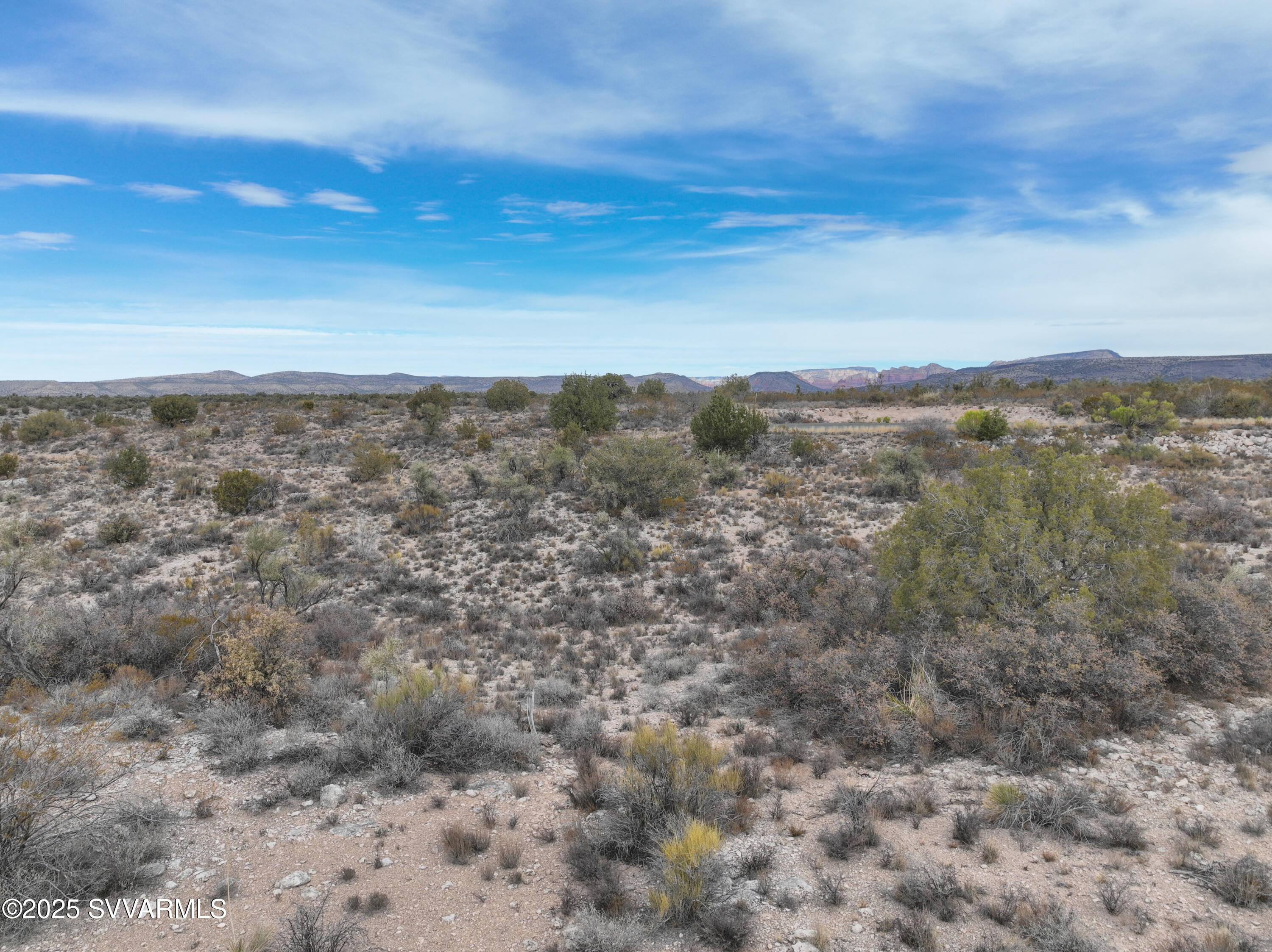 6745 North Canyon Road, Unit 104 Rimrock, AZ 86335 - Photo 20 of 31 an aerial view of houses covered in trees