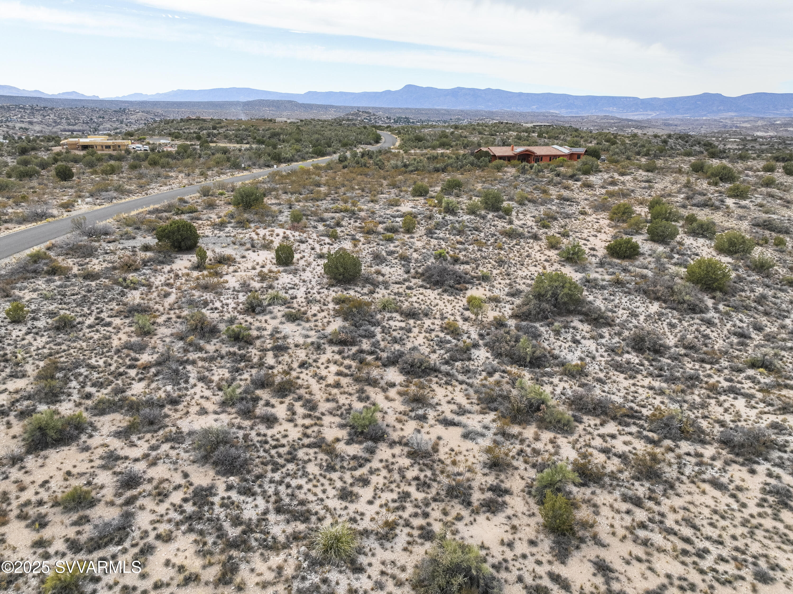 6745 North Canyon Road, Unit 104 Rimrock, AZ 86335 - Photo 8 of 31 an aerial view of residential houses with outdoor space and mountain view