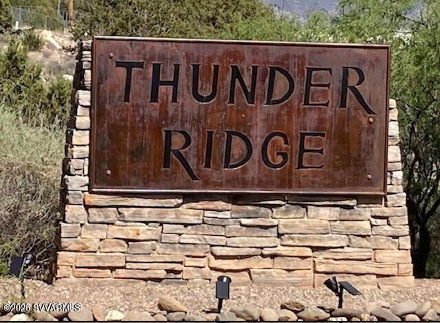 6745 North Canyon Road, Unit 104 Rimrock, AZ 86335 - Photo 9 of 31 a wooden sign on the side of a building