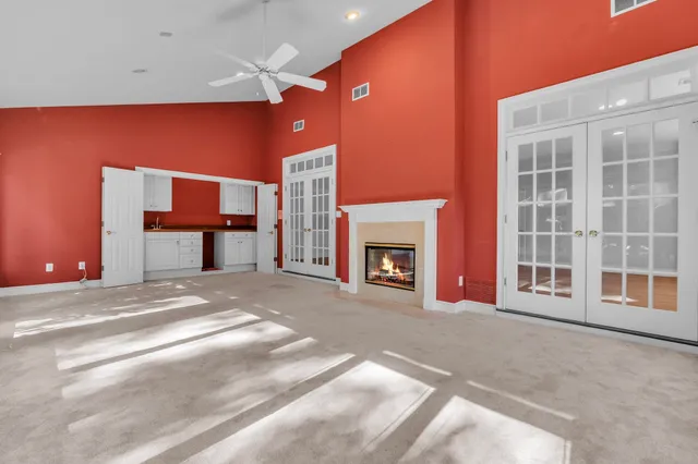 a view of livingroom with fireplace and window