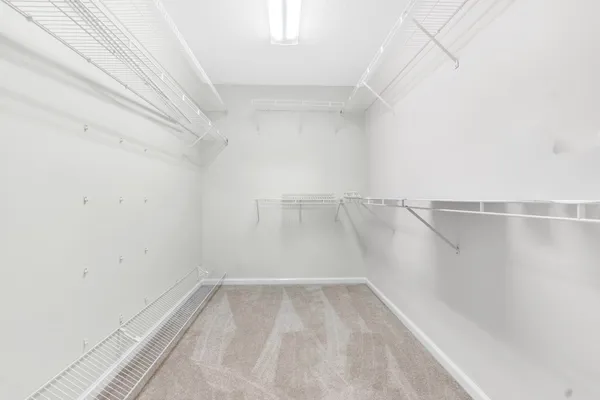 a view of a room with racks on the wall