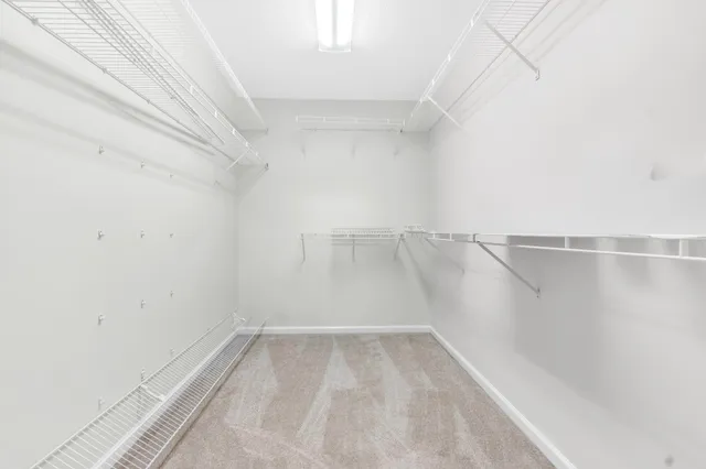 a view of a room with racks on the wall