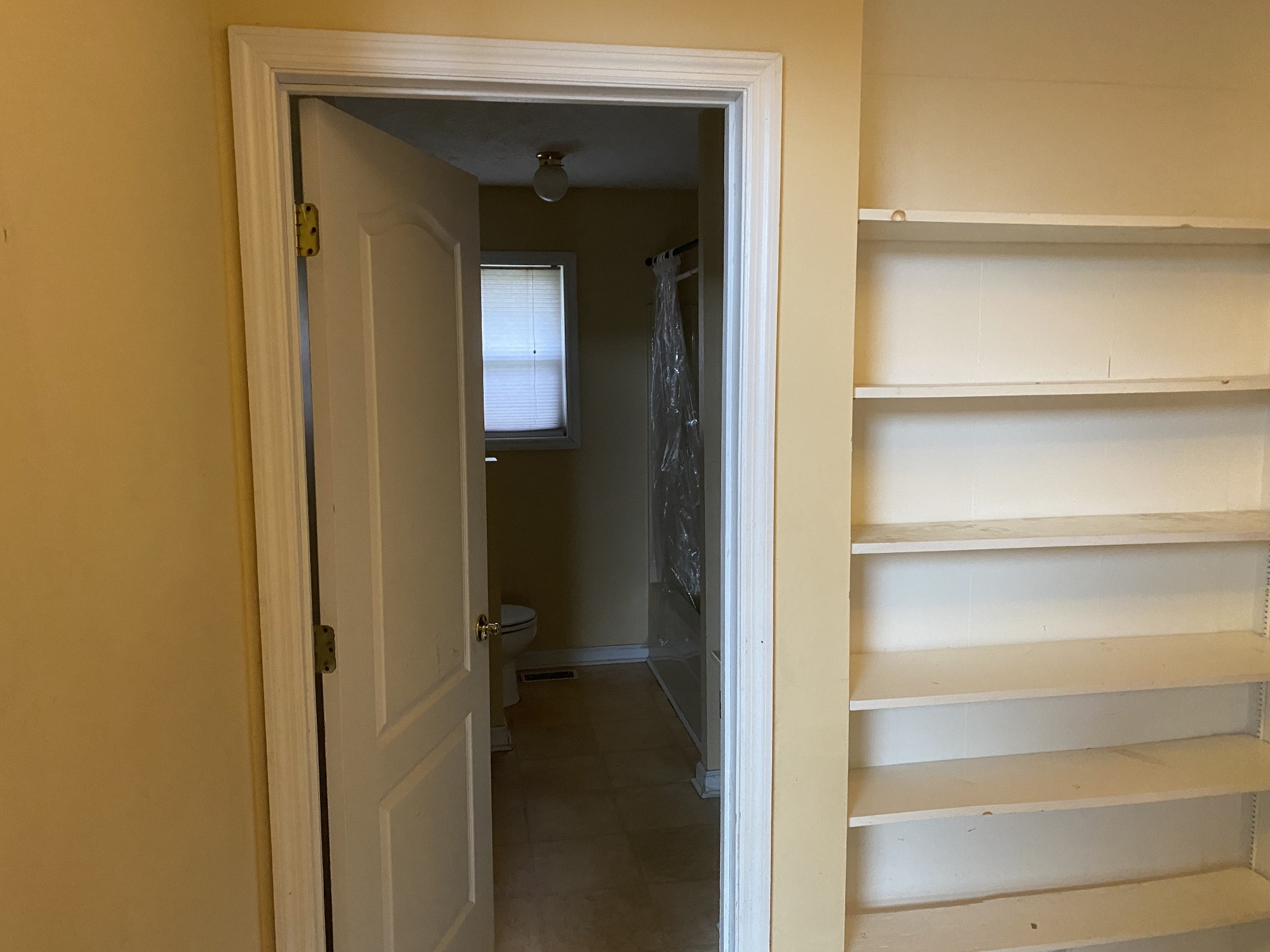 113 Lake Wood Road Lebanon, TN 37087 - Photo 11 of 19 a view of a hallway with wooden shelves