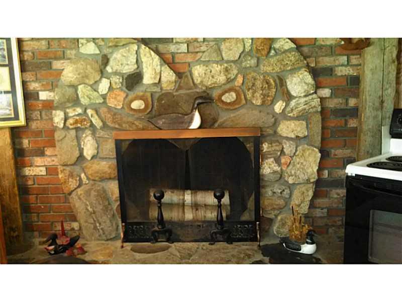 19 Blue Road Monmouth, ME 04259 - Photo 18 of 35 Family Room. stone and brick...