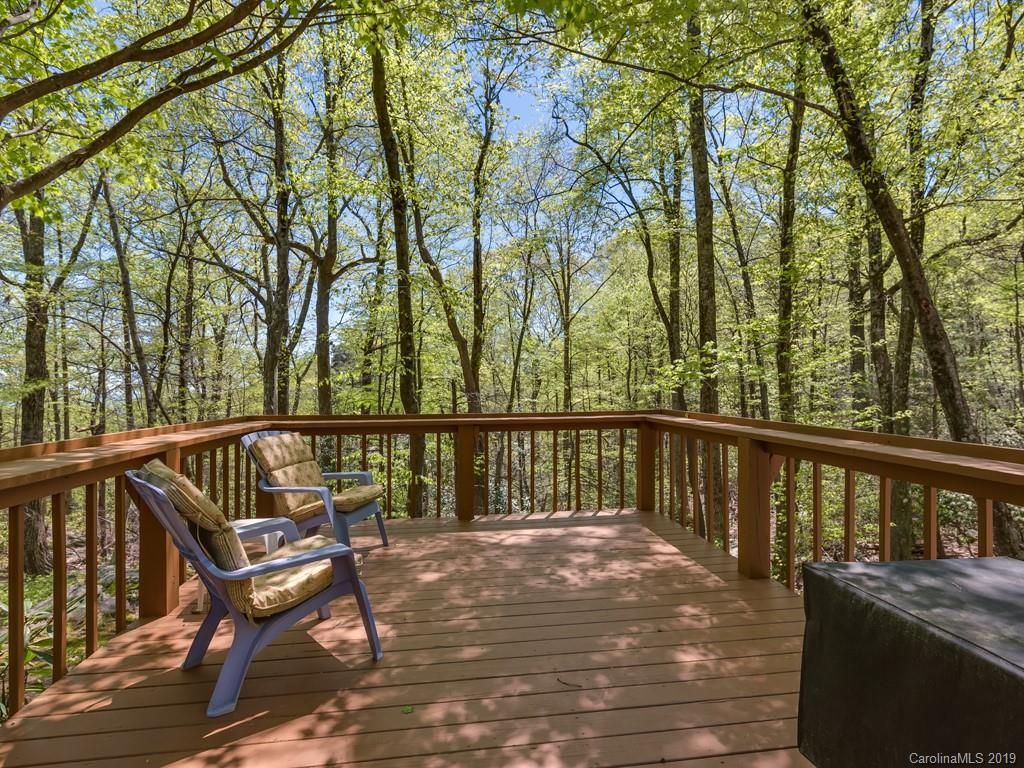1251 Judes Gap Road Mill Spring, NC 28756 - Photo 19 of 35 a view of a balcony with wooden floor and outdoor space