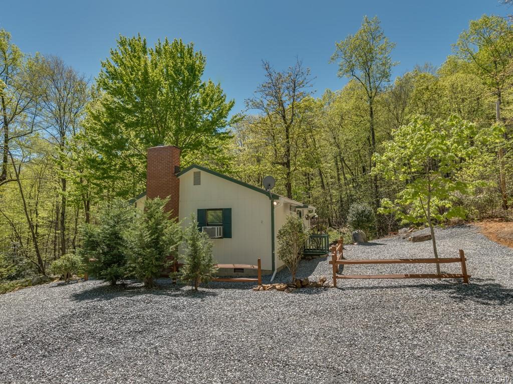 1251 Judes Gap Road Mill Spring, NC 28756 - Photo 27 of 35 a view of backyard with green space