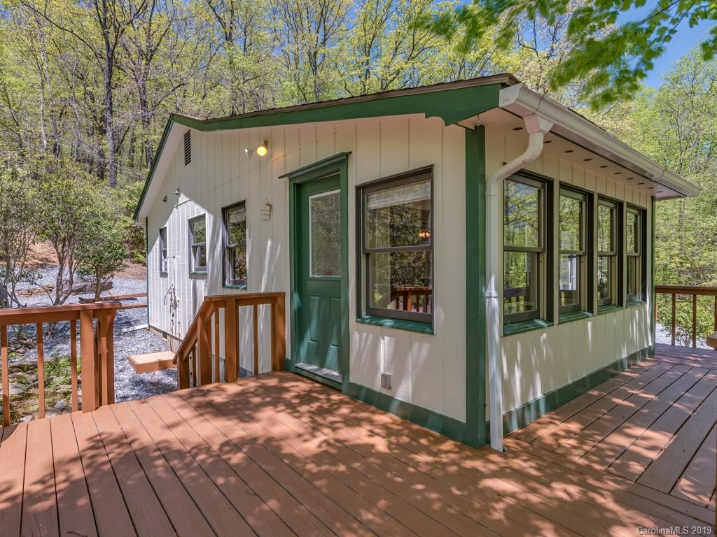 1251 Judes Gap Road Mill Spring, NC 28756 - Photo 6 of 35 a view of a house with a porch