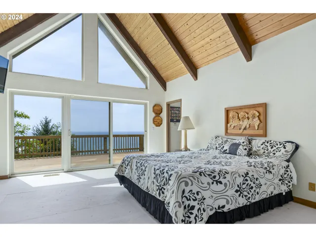 a bedroom with a bed and a walk in closet