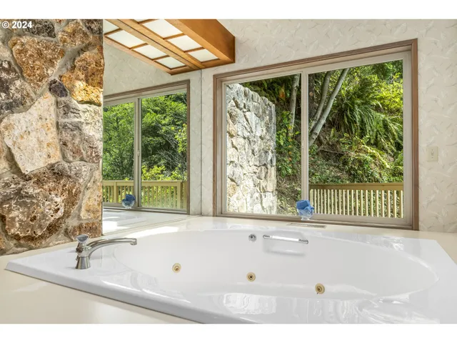 a bathroom with a bathtub and a sink