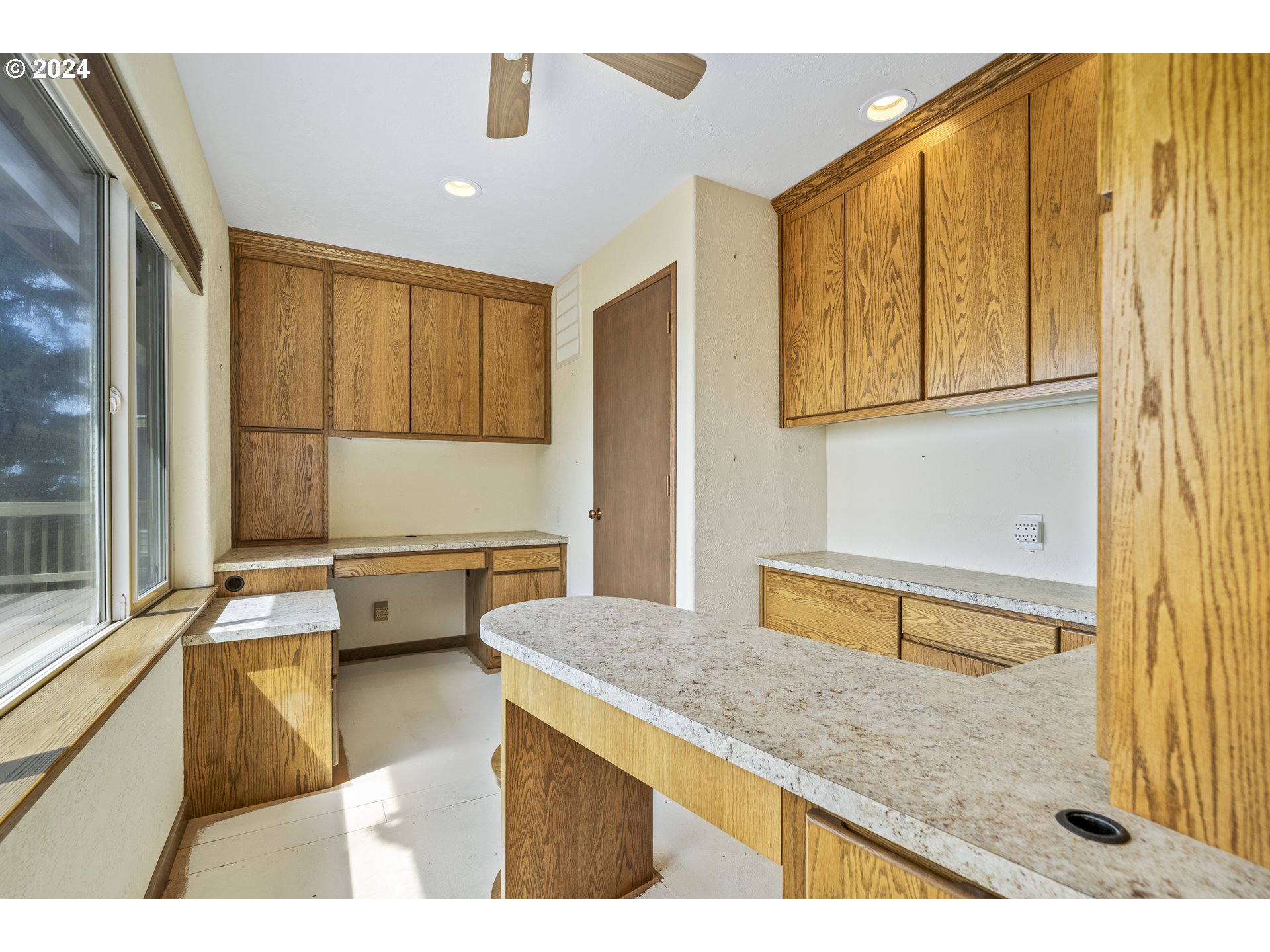 94515 Highway 101 Yachats, OR 97498 - Photo 29 of 45 a kitchen with a sink and a window