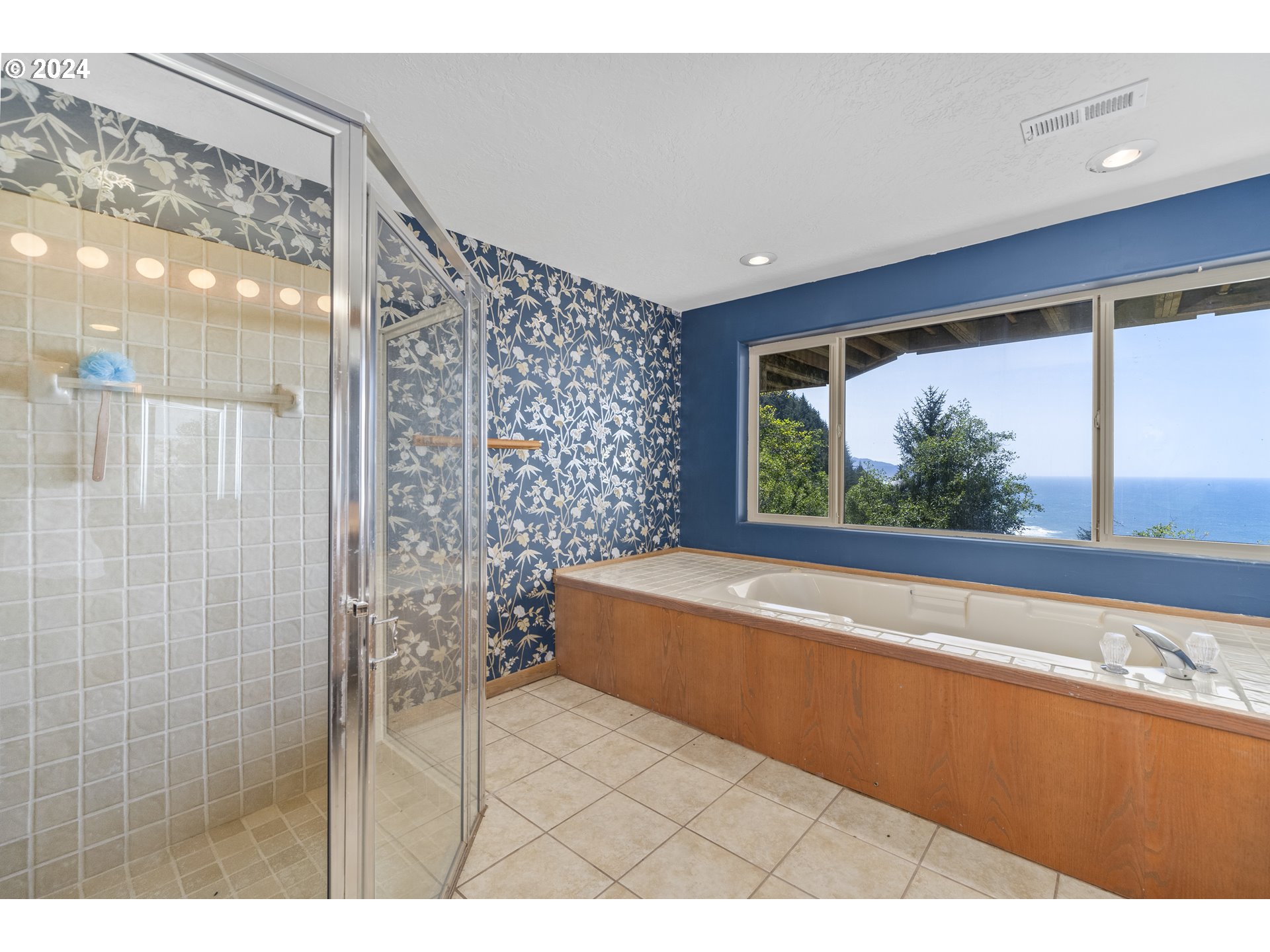 94515 Highway 101 Yachats, OR 97498 - Photo 34 of 45 a bathroom with a bathtub and a shower