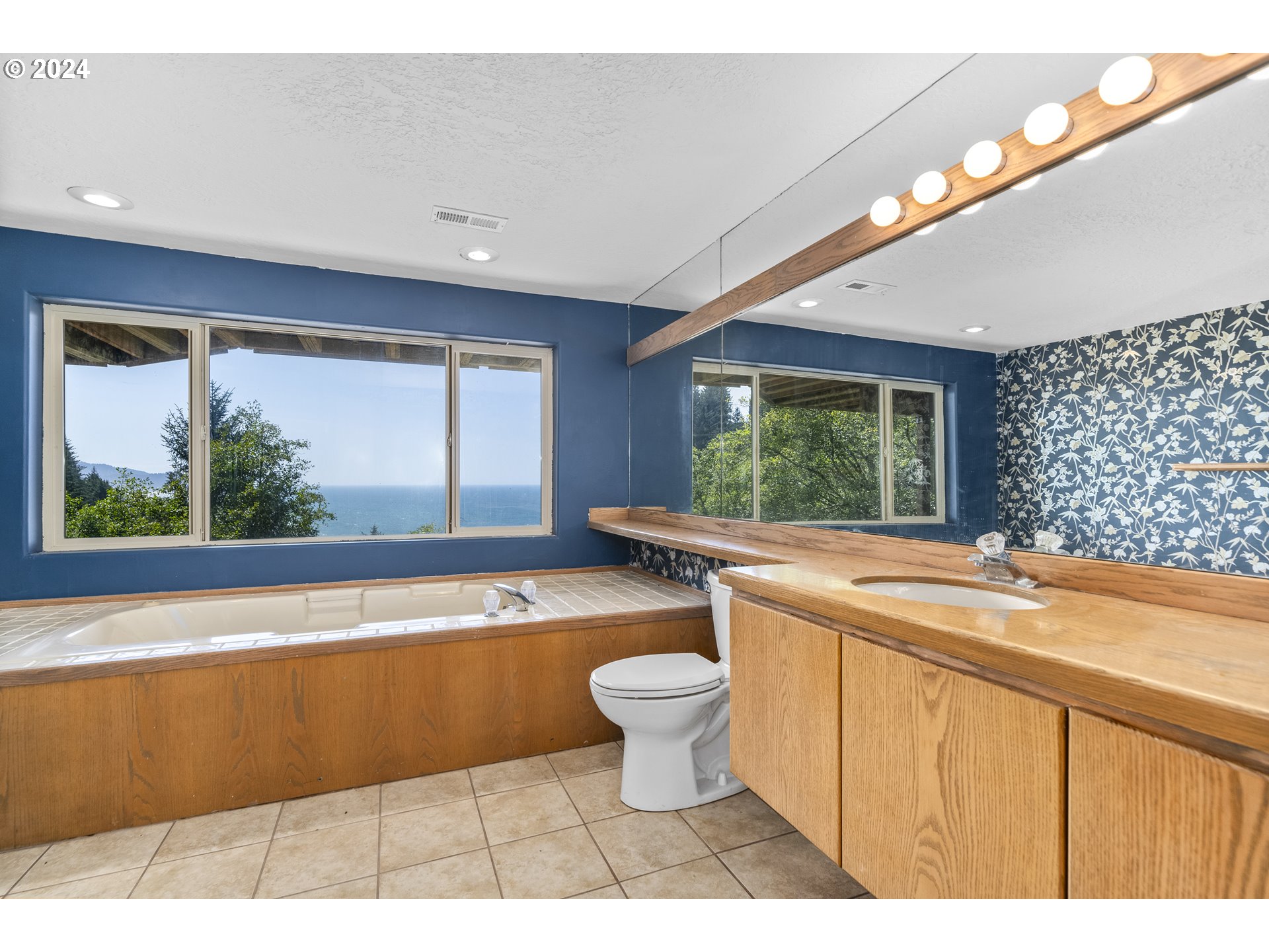 94515 Highway 101 Yachats, OR 97498 - Photo 35 of 45 a bathroom with a bathtub sink and toilet