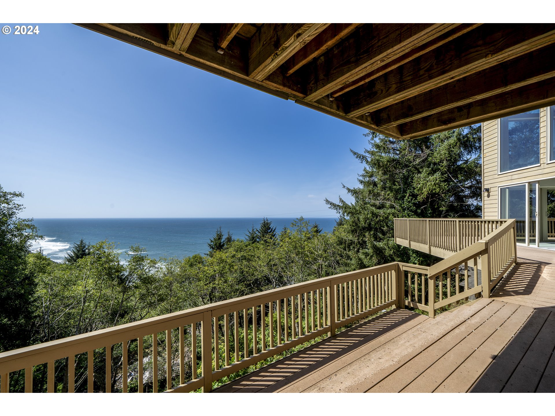 94515 Highway 101 Yachats, OR 97498 - Photo 42 of 45 a view of balcony with wooden floor and fence