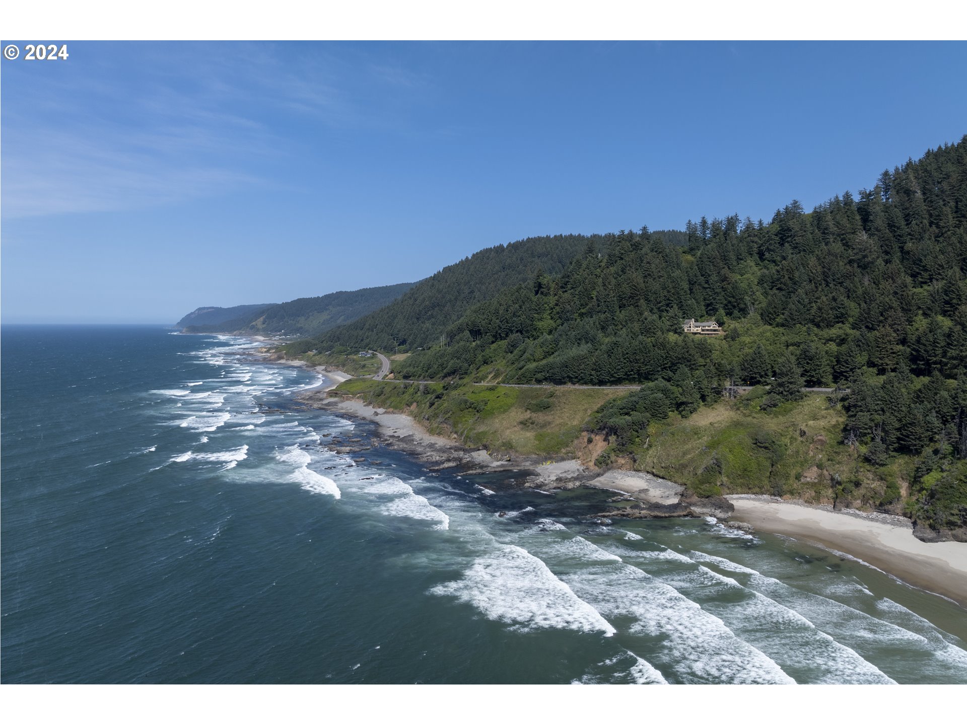 94515 Highway 101 Yachats, OR 97498 - Photo 8 of 45 a view of a lake with a mountain in the background