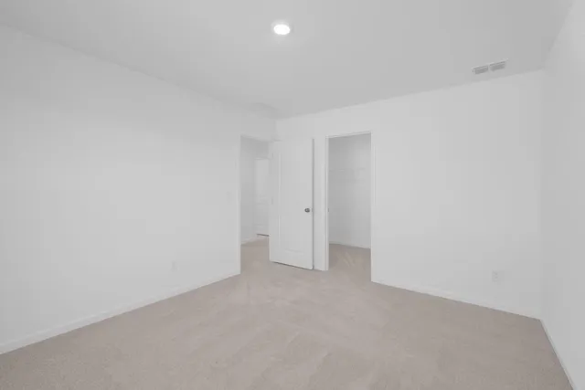 a bathroom with a double vanity sink and mirror