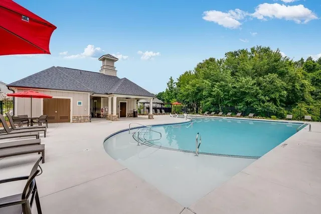 a view of a lake with a yard