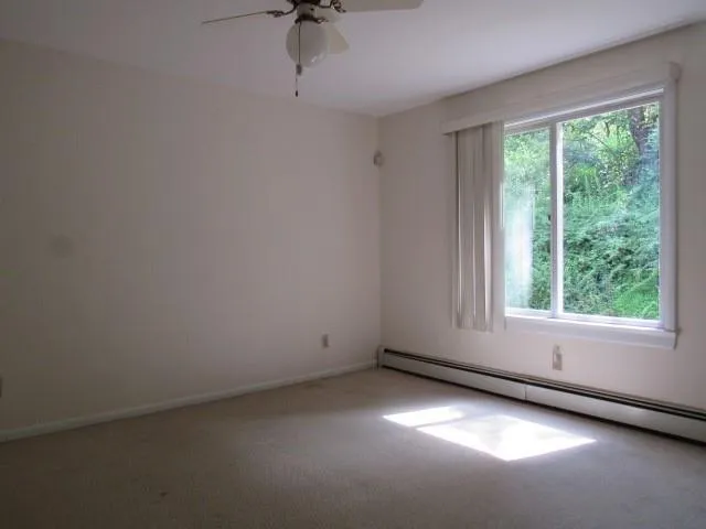 an empty room with windows