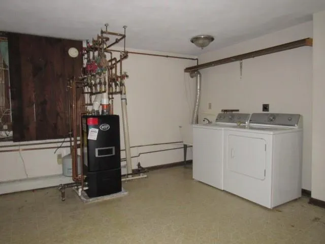 a view of a house with a street