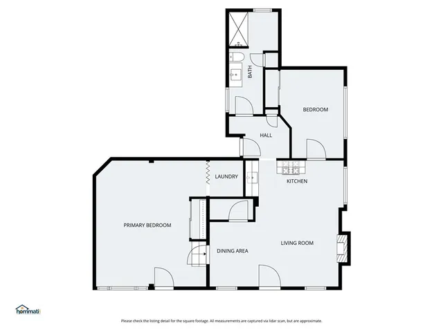an aerial view of a house with outdoor space and lake view
