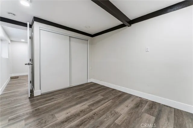 a view of workspace with wooden floor