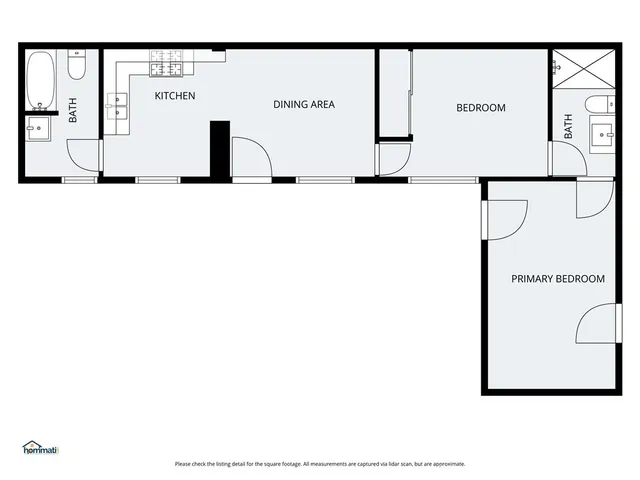an aerial view of a house with outdoor space and street view