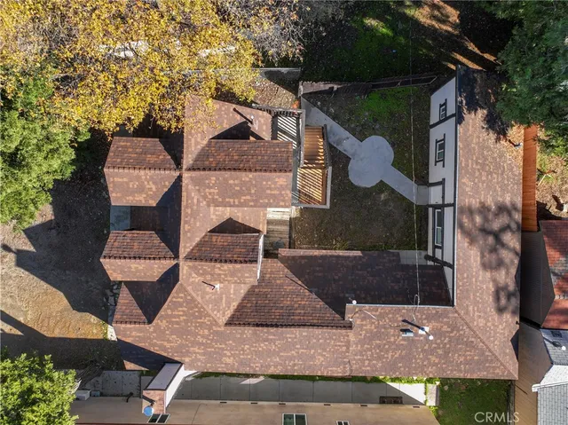 a bathroom with a granite countertop shower and a sink