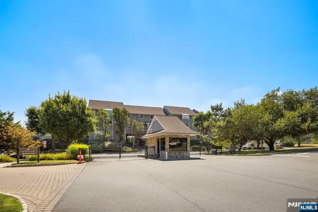 a view of a house with outdoor space and sitting area