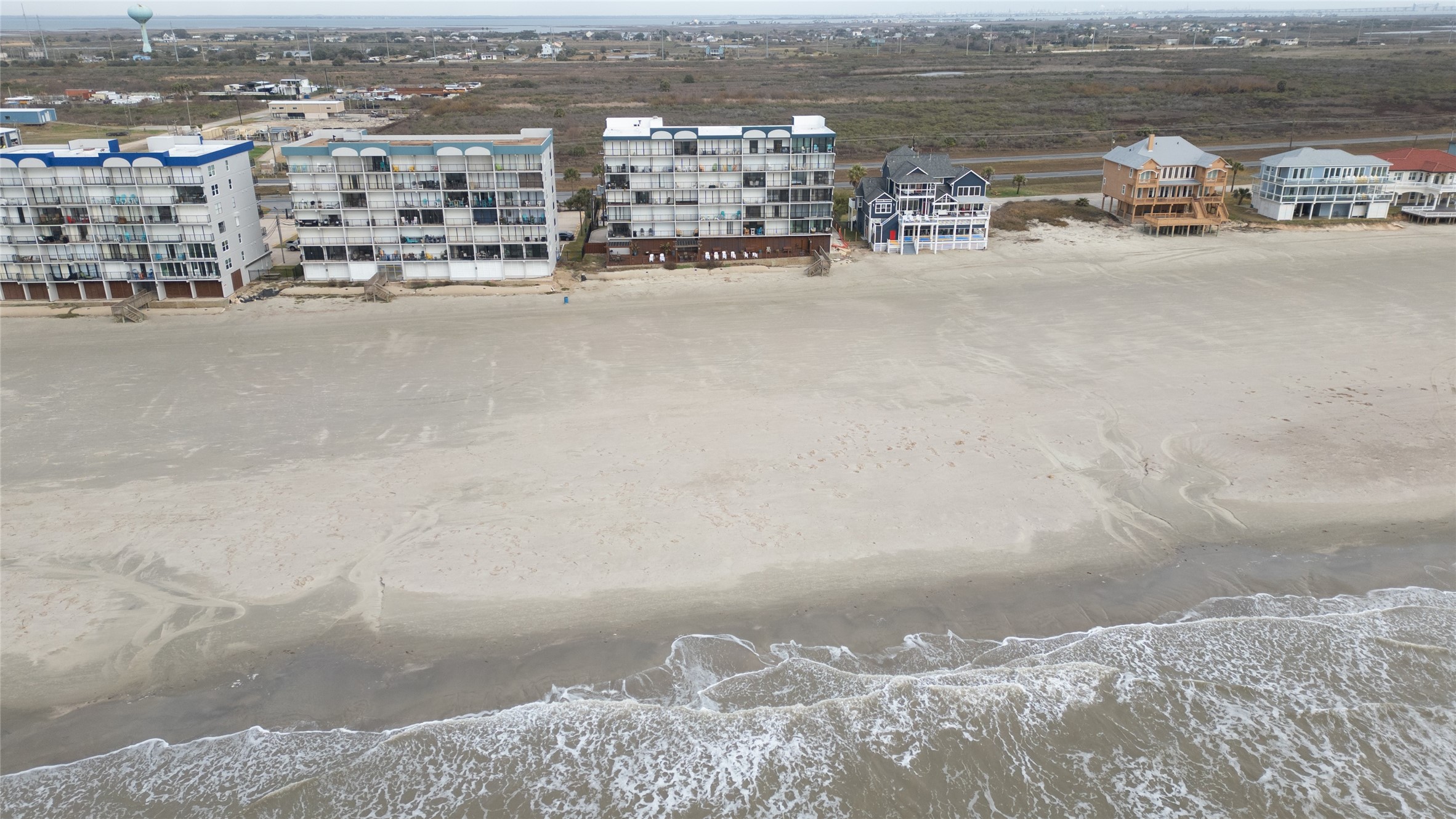 11945 Termini-San Luis Pass Road, Unit 202 Galveston, TX 77554 - Photo 20 of 20 a view of a city