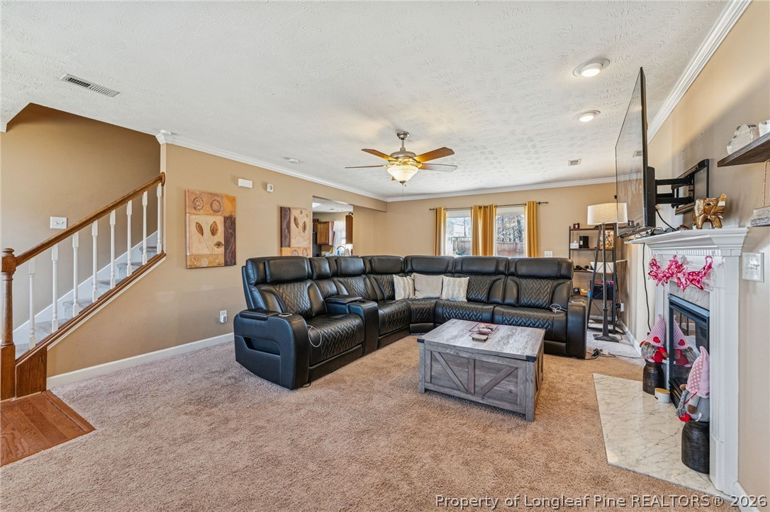 295 Pender Road Spring Lake, NC 28390 - Photo 17 of 30 a living room with furniture and a flat screen tv