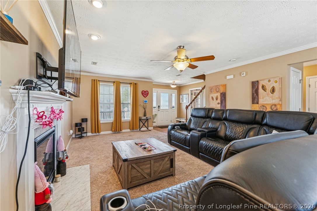 295 Pender Road Spring Lake, NC 28390 - Photo 18 of 30 a living room with furniture and a flat screen tv